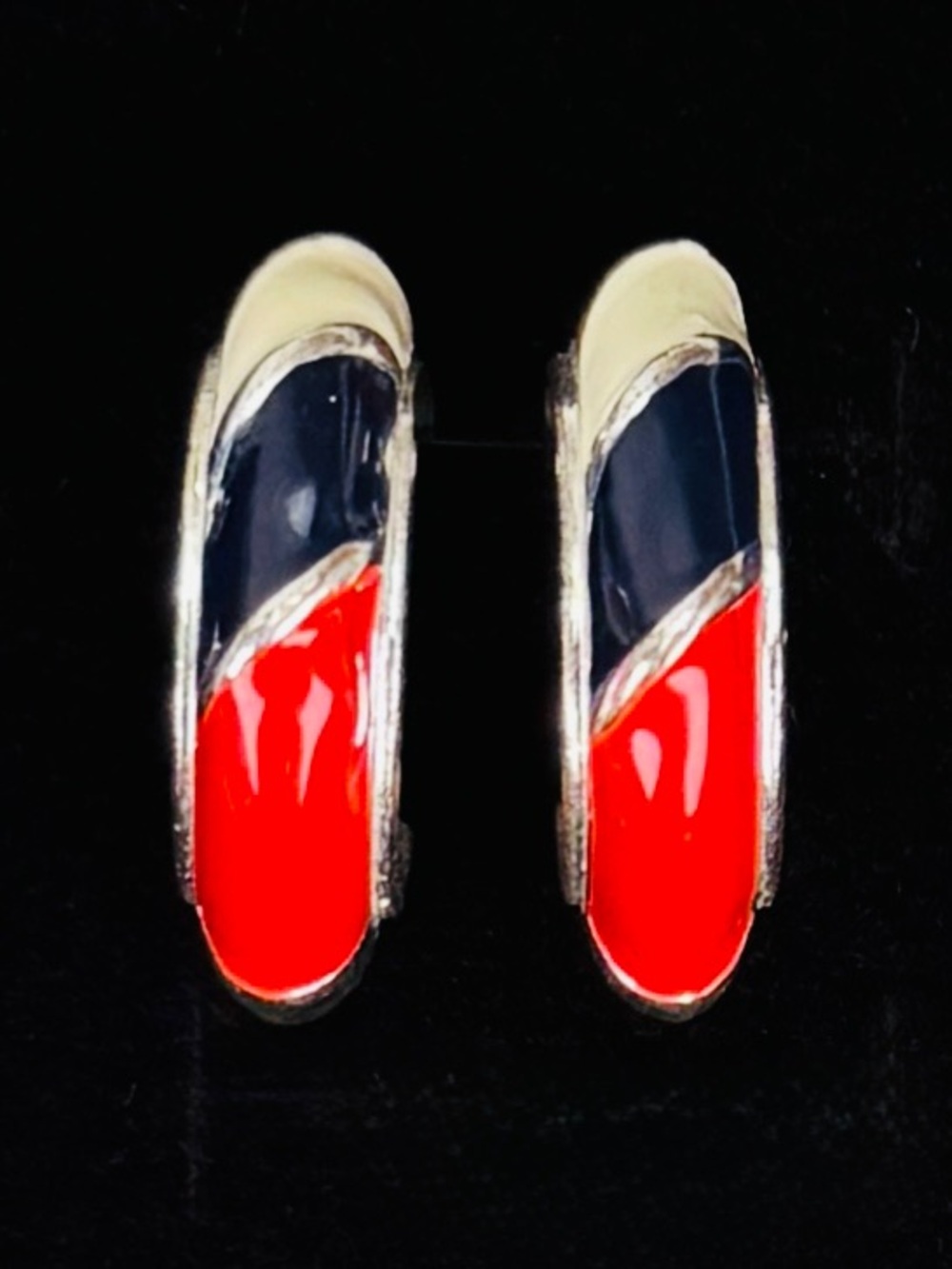 Silvertone, red white and black enamel open hoop pierced earrings